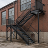 Custom Industrial Steel Stair Structure with Platform and Safety Handrails